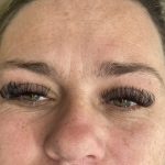close up of woman's face with eyelashes